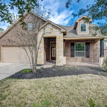 Rent this 4 bed house on 164 Jaxxon Pointe Drive in Montgomery County, TX 77316