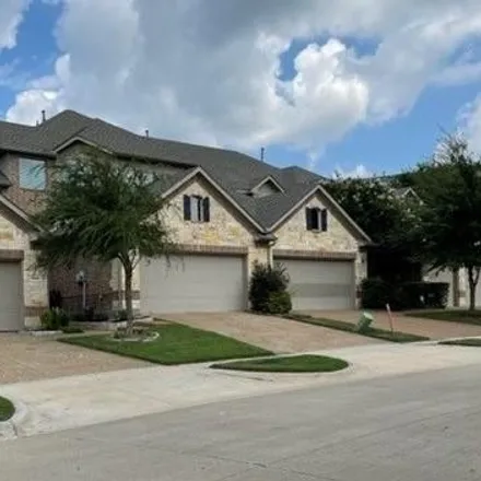 Rent this 2 bed townhouse on 1909 Osprey Lane in Garland, TX 75044