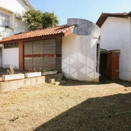 Buy this 4 bed house on Rua Carlos Huber in Três Figueiras, Porto Alegre - RS