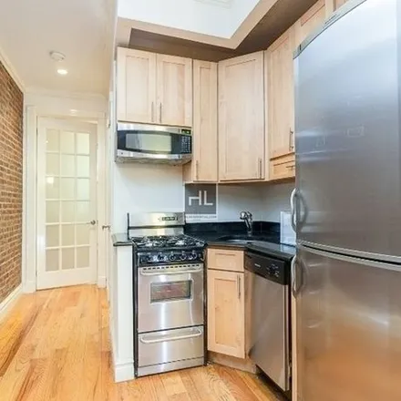 Rent this 4 bed apartment on Church of the Sacred Heart of Jesus in 457 West 51st Street, New York