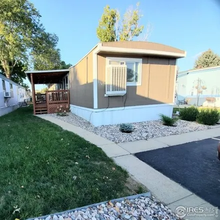 Buy this studio apartment on 221 W 57th St Lot 34b in Loveland, Colorado