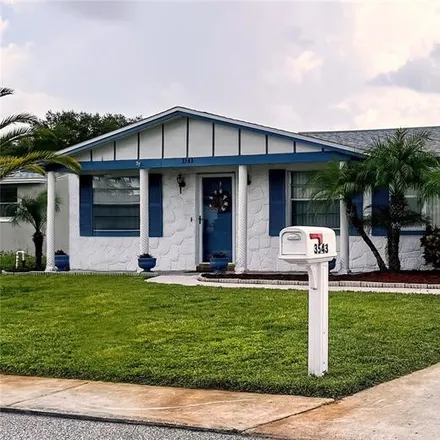 Buy this 2 bed house on 3543 Seffner Drive in Holiday, FL 34691