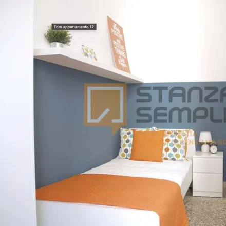 Rent this 4 bed room on Via Libertà 28b in 40059 Medicina BO, Italy