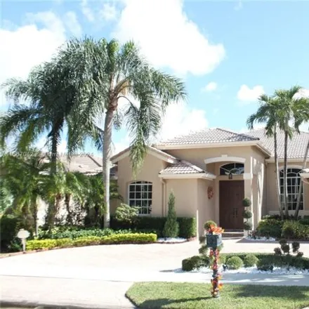 Rent this 5 bed house on 2526 Jardin Drive in Weston, FL 33327