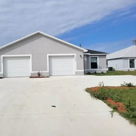 Rent this 3 bed house on Southwest 44th Street in Cape Coral, FL 33914