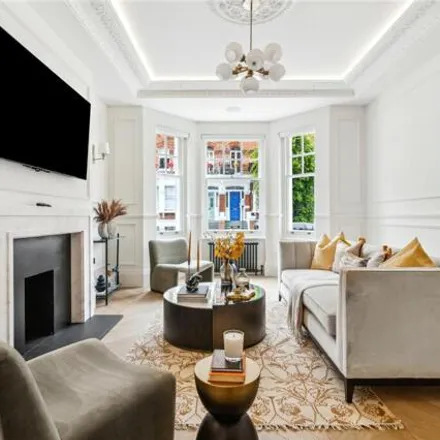 Buy this 5 bed townhouse on 43 Avonmore Road in London, W14 8RU