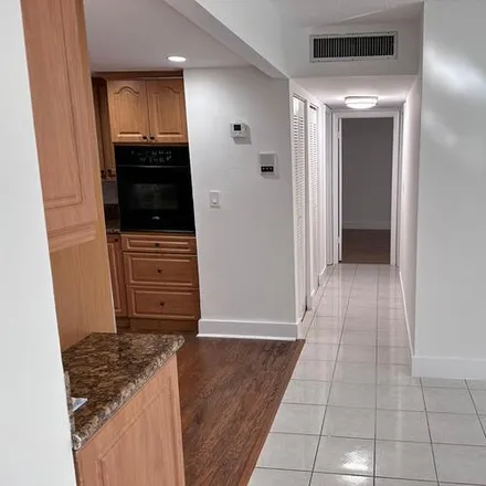 Image 1 - 4265 NW S Tamiami Canal Dr, Unit 101 - Apartment for rent
