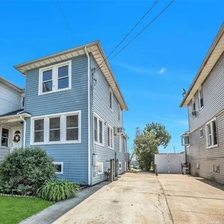 Buy this 3 bed house on 3319 Murdock Avenue in Oceanside, NY 11572
