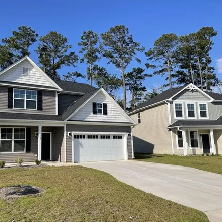 Buy this 4 bed house on Lighthouse Cove Loop in Carolina Shores, Brunswick County