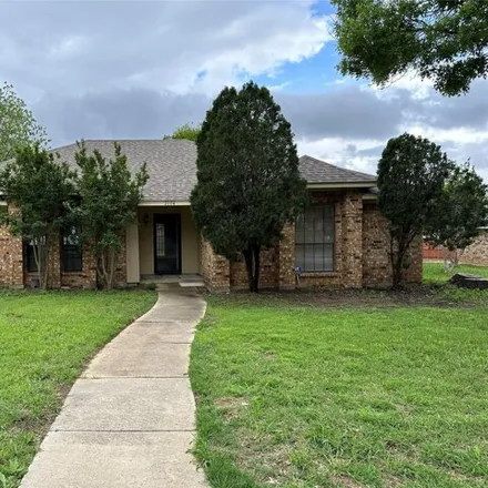 Rent this 3 bed house on 2104 Springwood in Carrollton, TX 75006