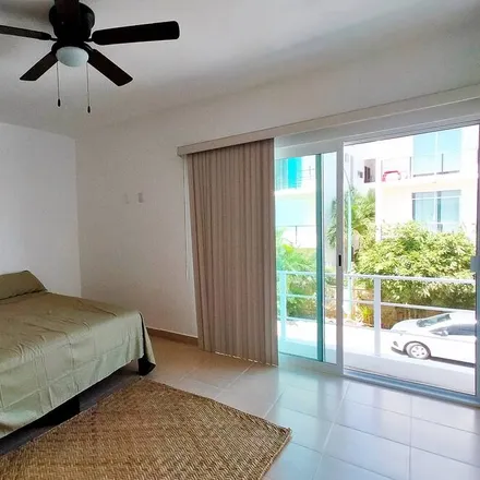 Rent this 3 bed house on Toks Playa del Carmen in Chemuyil 52 Mza 1Lt.1 Local A-10, Santa Fe