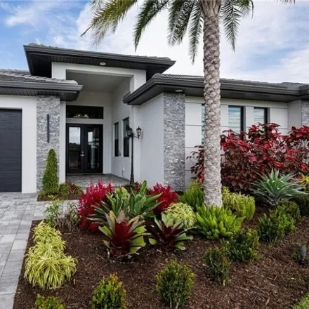 Buy this 4 bed house on 1479 Southwest 40th Terrace in Cape Coral, FL 33914