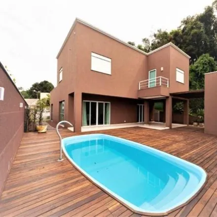 Rent this 4 bed house on Rua Luiz Tramontin 43 in Campo Comprido, Curitiba - PR