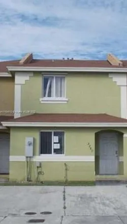 Buy this 3 bed townhouse on 2277 Northwest 136th Terrace in Opa-locka, FL 33054