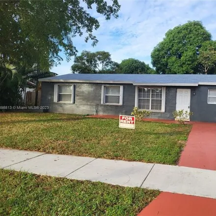 Rent this 4 bed house on 2321 Southwest 43rd Way in Broadview Park, Broward County