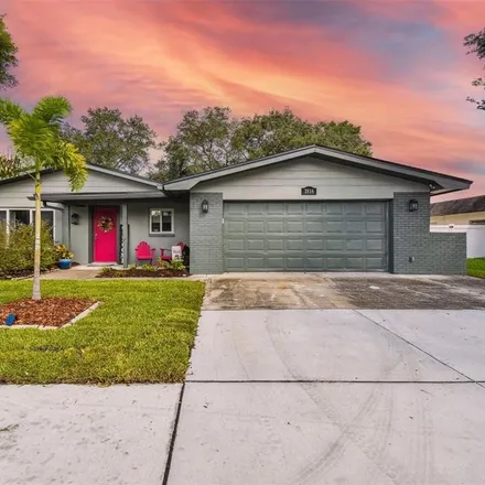 Buy this 4 bed house on 1806 Driftwood Circle in Harbor Palms, Oldsmar