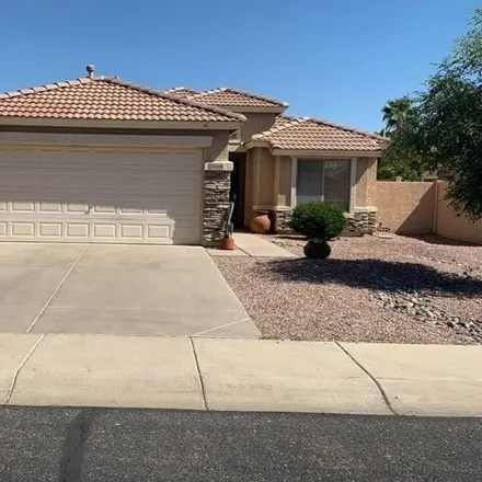 Rent this 3 bed house on 13448 West Port au Prince Lane in Surprise, AZ 85379