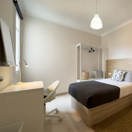 Rent this 6 bed room on Carrer de Verdi in 08001 Barcelona, Spain
