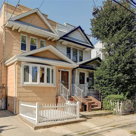 Buy this 3 bed house on 89-16 85th Street in New York, NY 11421