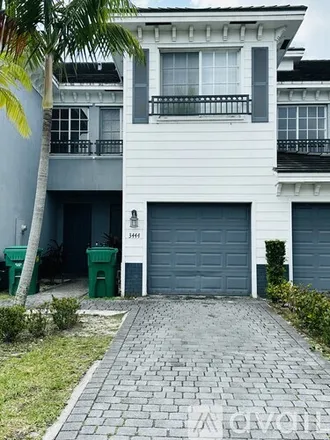 Rent this 3 bed townhouse on 3444 NW 13 Th St