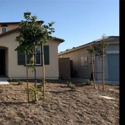 Rent this 4 bed house on 35309 Hutchison Pl in Beaumont, California