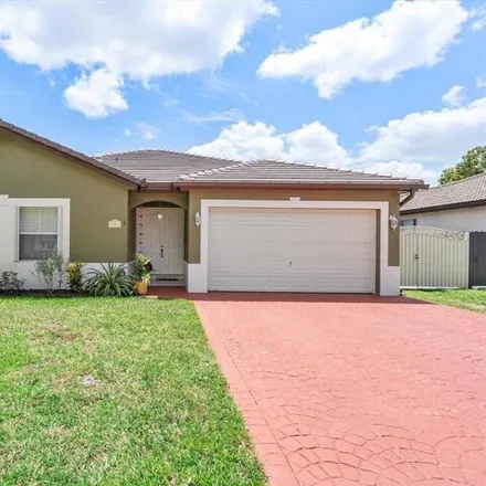 Buy this 3 bed house on 8806 Northwest 168th Lane in Miami Lakes, FL 33018