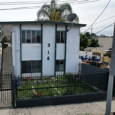 Buy this 16 bed house on West 2nd Street in Los Angeles, CA 90057