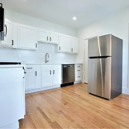 Rent this 4 bed townhouse on 15 Justin Road in Boston, MA 02135