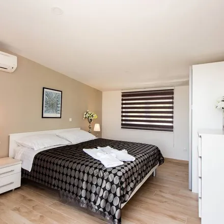 Rent this 6 bed house on Lokvičići in Split-Dalmatia County, Croatia