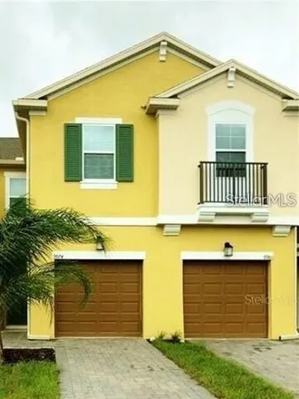 Rent this 3 bed townhouse on Red Eagle Drive in Orange County, FL 32825