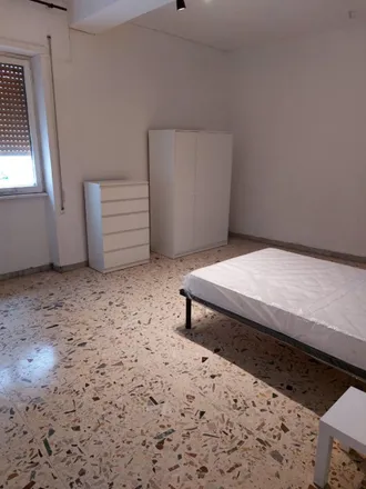 Rent this 4 bed room on Via dei Prati dei Papa in 00146 Rome RM, Italy