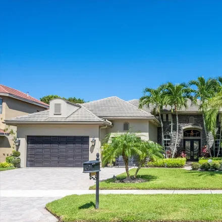 Rent this 4 bed house on 10690 Versailles Boulevard in Wellington, Palm Beach County