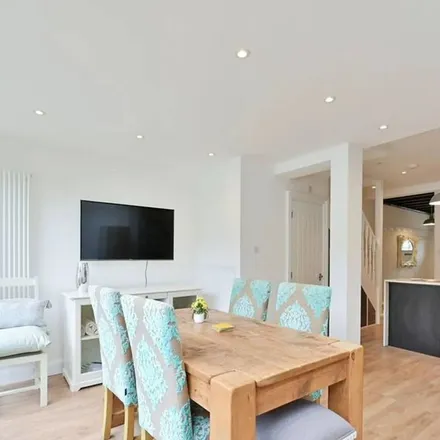 Rent this 4 bed apartment on Boscombe Road in London, SW19 3AY