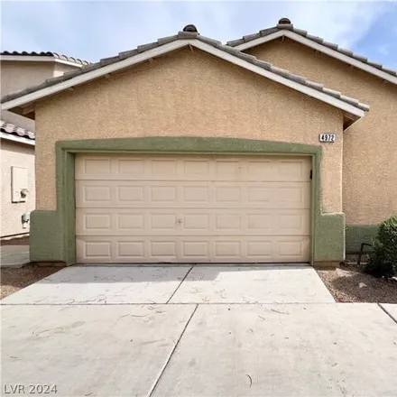 Rent this 3 bed house on 4988 South Miners Ridge Drive in Whitney, NV 89122