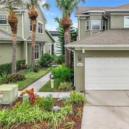 Buy this 4 bed townhouse on 10659 Whittington Ct in Largo, Florida