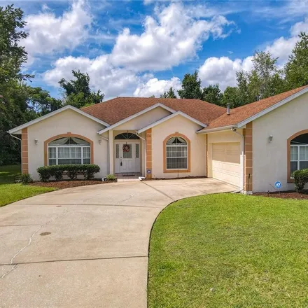 Buy this 3 bed house on 1042 Seagate Drive West in Deltona, FL 32725