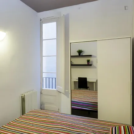 Rent this 4 bed room on Carrer de Sant Pere Més Baix in 22, 08003 Barcelona