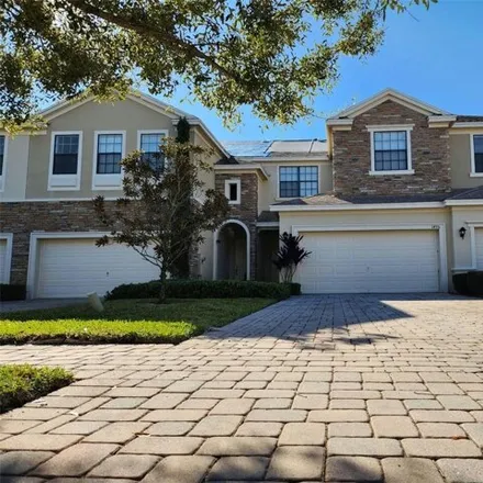Rent this 3 bed house on 1428 Portofino Meadows Boulevard in Meadow Woods, Orange County
