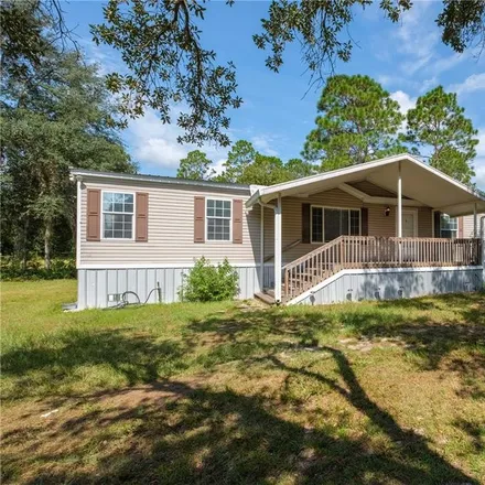 Buy this 3 bed house on 8950 Northeast 107th Court in Levy County, FL 32621