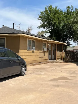 Rent this 2 bed duplex on Martin's Auto Sales in 45th Street, Lubbock