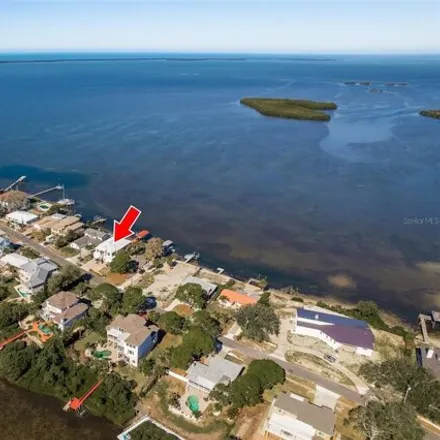 Buy this 3 bed house on 1686 Seabreeze Drive in Tarpon Springs, FL 34689