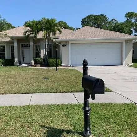 Rent this 4 bed house on 381 Chennault Lane in Rockledge, FL 32955