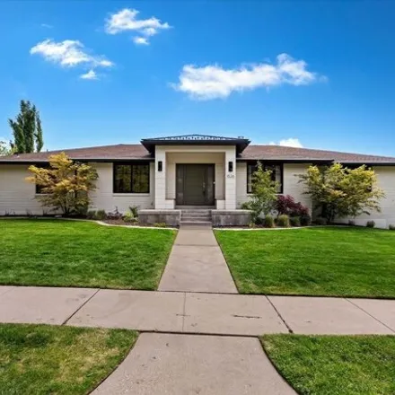 Buy this 4 bed house on 1526 Tomahawk Drive in Salt Lake City, UT 84103