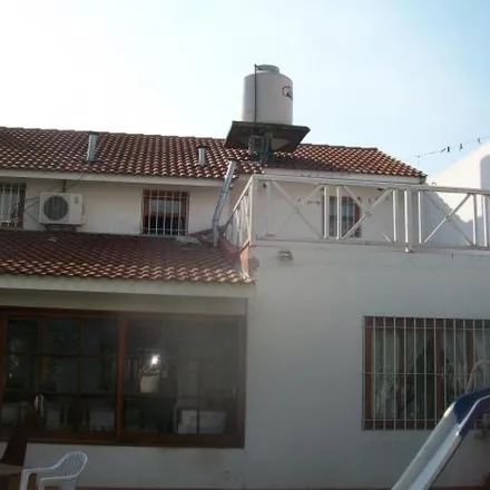 Buy this 4 bed house on Puccini in Partido de Hurlingham, 1688 Hurlingham