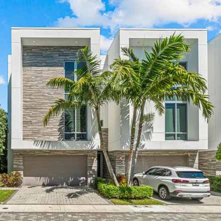 Rent this 3 bed townhouse on Pondhawk Natural Area in Northwest 17th Avenue, Boca Raton