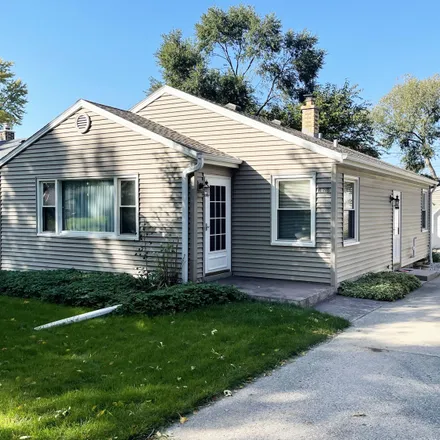 Buy this 3 bed house on 11218 West Wisconsin Avenue in Wauwatosa, WI 53226
