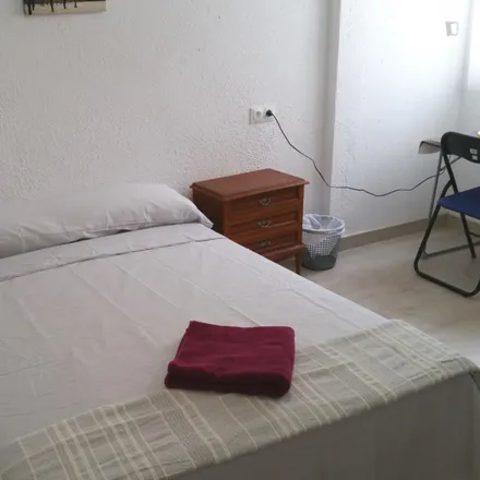 Rent this 3 bed room on Carrer d'Antonio Ponz in 7, 46011 Valencia