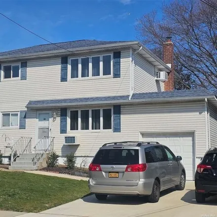 Rent this 3 bed house on 43 Guildford Park Drive in West Babylon, NY 11704