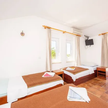 Rent this 11 bed house on 53291 Grad Novalja