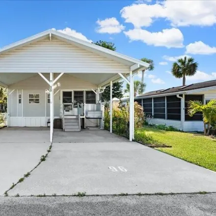 Buy this studio apartment on Sunset Drive in Brevard County, FL 32780